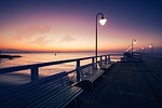 baltic sea sunset poland colours sunrise pier nature stock photo