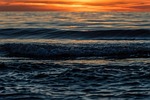 sunset sea beach waves sun coast water norlev-beach stock photo