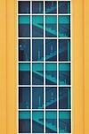 stair windows glass door net yellow blue skyscrapers stock photo