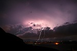 thunderstorm lightning night greece nature crete sea riverbank stock photo