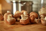 mushrooms brown cook meal food close up preparation stock photo