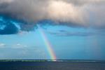 rainbow beach sea fakarava atoll island coral sky stock photo
