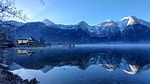 lake mountains fog landscape nature austria reflection sky stock photo