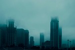 doomsday style cyan-blue foggy day ruins city building stock photo