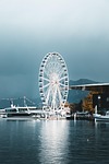 river ferris wheel buildings camper van camping cities stock photo