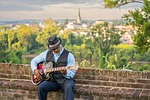 man music guitar senior countryside portrait stock photo