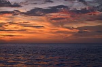 sunset nature sky sea ocean peaceful horizon stock photo