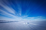 ice snow nature barren clouds sky antarctica landscape stock photo