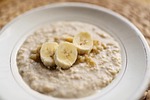 porridge banana baby food meal breakfast oats stock photo
