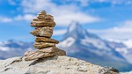 cairn stone tower balance rock stability nature harmony stock photo