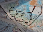eyeglasses world map of the nickel glasses vacations stock photo