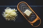 cheese grater grated dairy product gouda food stock photo