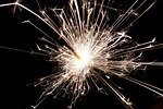 firecracker sparkler new year sparks glowing sparkle bright stock photo