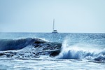 sailboat sea waves nature atlantic ocean storm spain stock photo