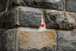 stones heart wall love graffiti stock photo