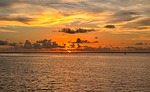 sunset clouds orange sea sky atmosphere nature stock photo