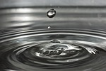 water drop ripples wave small nature droplet drip stock photo