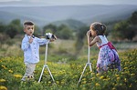 children photographers taking pictures boy girl kids young stock photo